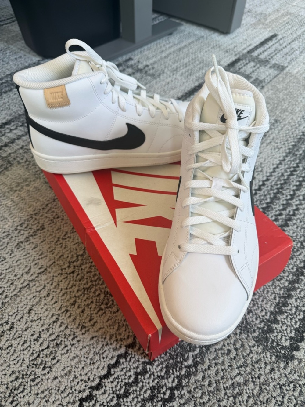 Nike White High-Top Sneakers with Black Swoosh and Tan Heel Tab